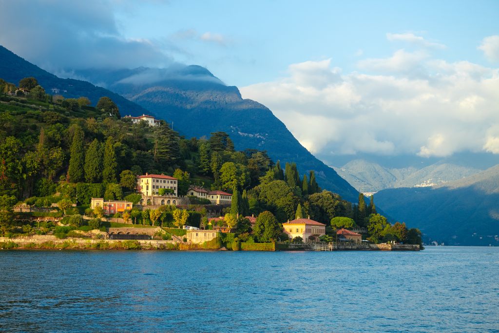 Lake with mountains behind it