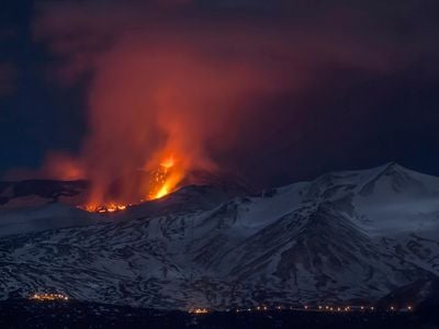 Mt. Etna spews lava during the early hours of Thursday, March 16, 2017