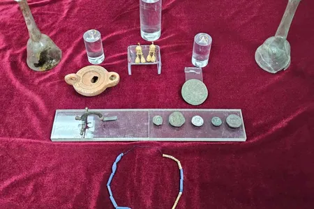 The trove of goods was discovered alongside the graves of three individuals who died 1,700 years ago.