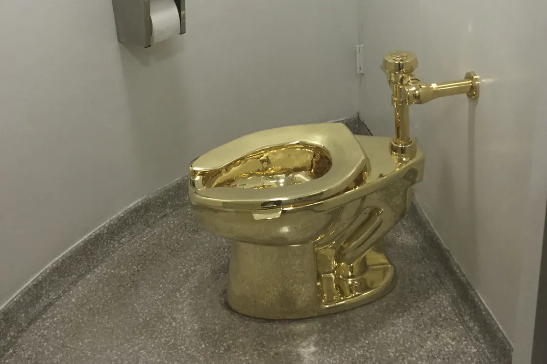 Solid gold toilet made by Maurizio Cattelan