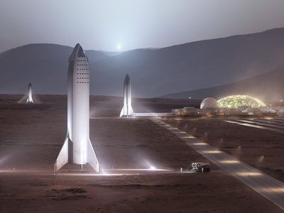 A mini-fleet of Starships wait near a Martian base in this SpaceX artist's conception. 
