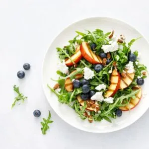 Plated salad with fruit