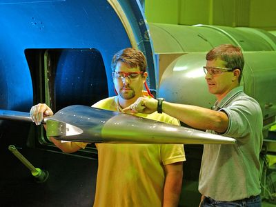 At Wind Tunnel 9 in White Oak, Maryland, engineers Joe Norris (left) and Jon Lafferty conduct basic research on Hypersonic Technology Vehicle-1. HTV-1 did not fly, but its successor, HTV-2, did, boosted to Mach 20 in 2010 and 2011.