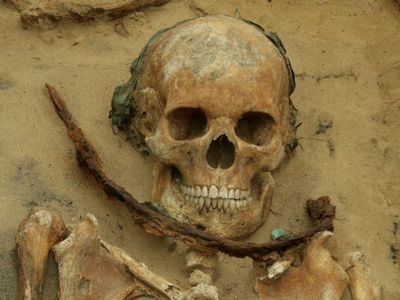 One of the excavated burials in Drawsko, Poland showed a skeleton with a sickle placed over its neck, likely to prevent the dead from rising again as the undead.
