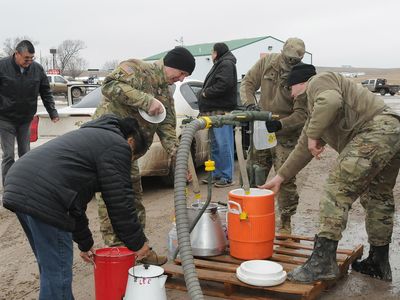 South Dakota National Guard distributes drinkable water at the Pine Ridge Indian Reservation.