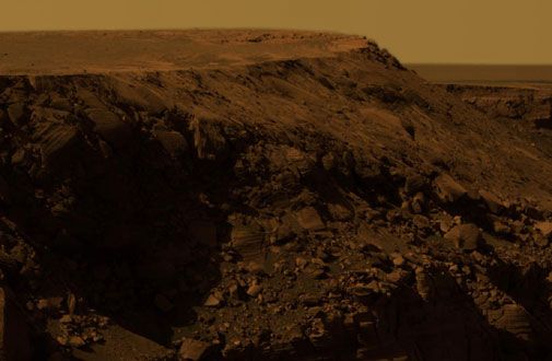On the edge of a Martian crater.