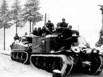 Tank convoy through the Ardennes, Belgium, during the Battle of the Bulge in January 1945