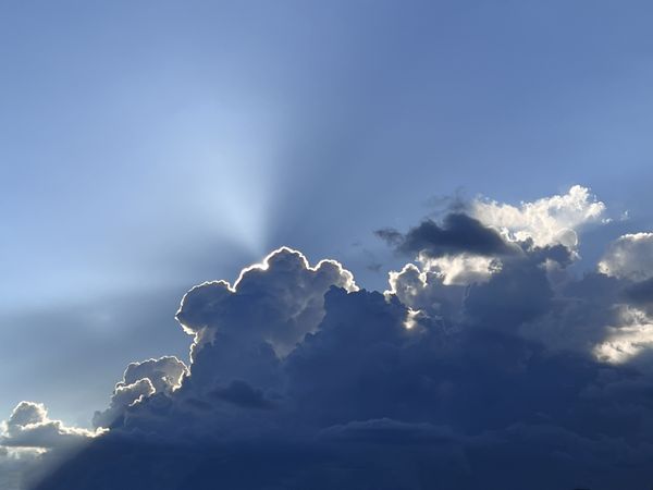 Sunburst and Silver-Rimed Clouds thumbnail