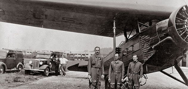 Captain Carl Crane, who invented the autoland system, Captain George Holloman, and engineer Raymond Stout