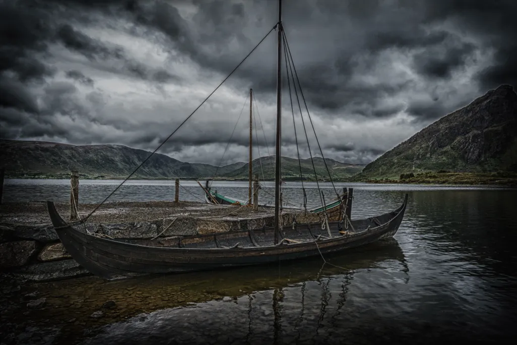 Long boat sits on a dock