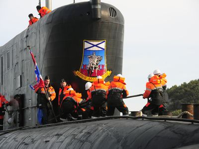 The Borei class nuclear-powered submarine Yuri Dolgoruky arrives at the Russian Northern Fleet's naval base after tests. September 9, 2013.