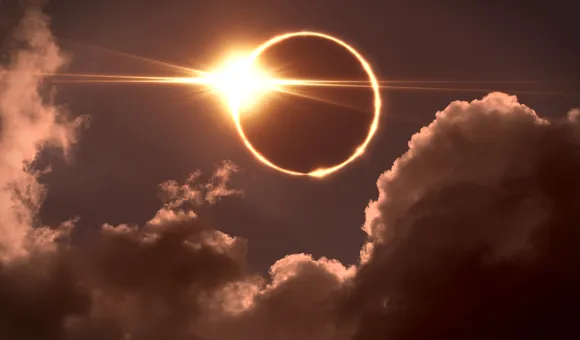 Astronomy_Total solar eclipse with clouds_DT_122398998.jpg