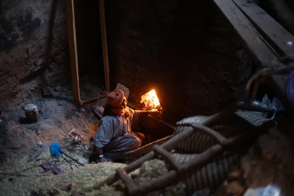 A man feeds the fire for the hamman in Marrakesh thumbnail