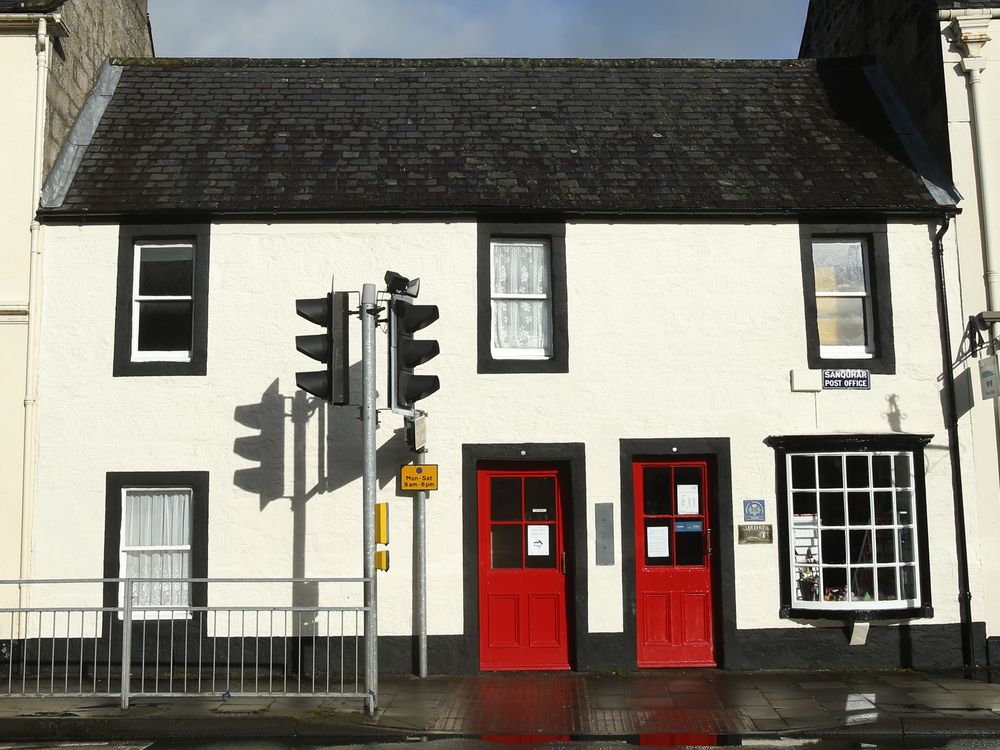 White building with red doors