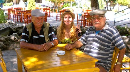 American backpacker Julia Pasternack shares a moment with two Turkish gentlemen.