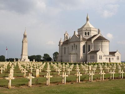 The Notre Dame de Lorette military cemetery near Arras in northern France is the burial place of 40,000 French soldiers. Each grave is marked with a simple white cross bearing the soldier's name.