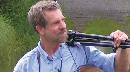 Legendary birdwatcher, artist and author Kenn Kaufman discusses the phenomenon of migration at the National Zoo on Thursday.