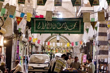 "Syria, Souk of Aleppo"

In the Souk of Aleppo, with a Mamluk portal leading to a courtyard to the right, 2008