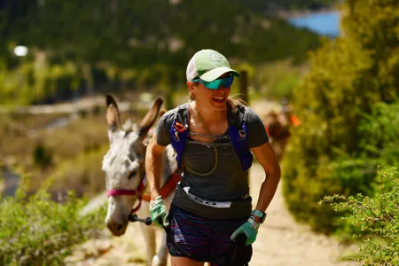 Jennifer Stewart and her burro Sheba tackle the 9-mile pack burro race in Georgetown, Colorado, in 2019.