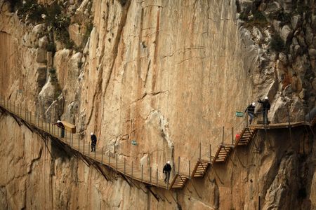 Journalists walk along the new Caminito del Rey in El Chorro-Alora, March 15, 2015.