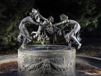 With fingers intertwined and mouths gleefully thrown open, the three maidens dance around the Art Nouveau sculpture by Walter Schott.