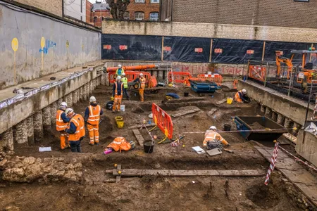 Archaeologists unearth a limestone foundation of one of the buildings of St. Mary's College - an Oxford College left to decay 500 years ago as result of Henry VIII's dissolution of the monasteries.