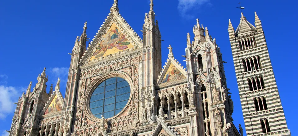  The facade and distinctive belltower of Siena's cathedral 