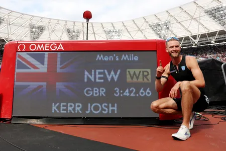 Josh Kerr celebrates after setting the new 1-mile world record, shattering the previous mark, which had stood for 27 years.