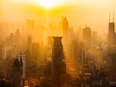 Smog glows in the sunset in Shanghai, China.