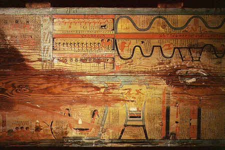 The floor of one of the coffins of Gua, a physician of the governor Djehutyhotep. The paintings, dated to 1795 B.C., show the “two ways”—land and sea—that the dead could use to navigate the afterlife. An even older “Book of Two Ways” has now been unearthed.