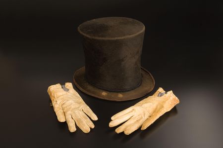 Stovepipe hat believed to have belonged to Abraham Lincoln, along with the bloodstained gloves he carried on the night of his assassination.