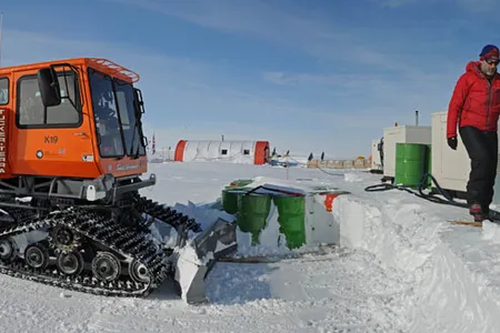 Barrels of fuel encased in snow at the Lake Ellsworth drilling site.