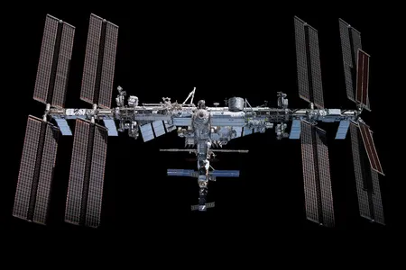This mosaic depicts the International Space Station pictured from the SpaceX Crew Dragon Endeavour during a fly around of the orbiting lab.