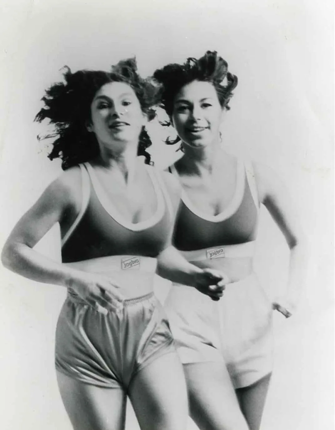 Two women running 1970s