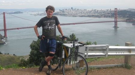 The author and his bike stand about 850 feet above San Francisco on Conzelman Road. Repeated 10 times, this little hill amounts to a world classic of climbing.