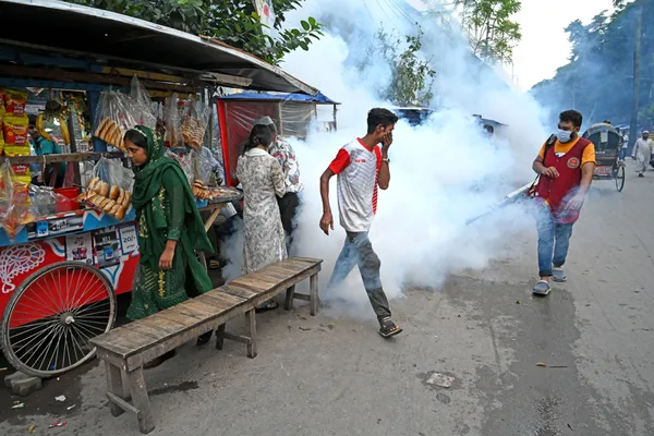 Sprays pesticide to kill mosquitoes in Dhaka. thumbnail