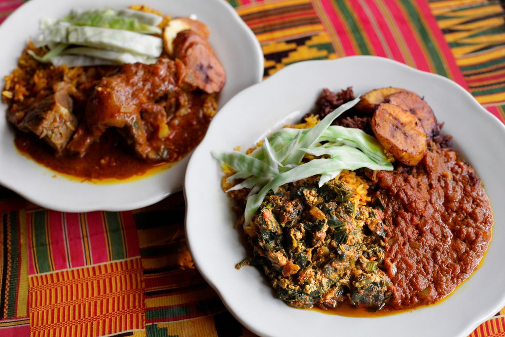Veggie Sample platter with Wakye rice and Black eyed peas, Jollof rice, spinach with Egusi (Mellon seed) in a tomato-based stew