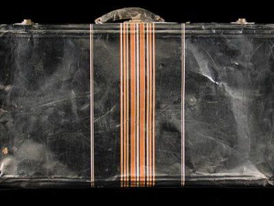 This black metal suitcase belonged to Iku Tsuchiya. It went with her to Tanforan Assembly Center, then to the Topaz camp, and back home to San Leandro, California.