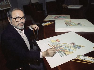 Maurice Sendak signing prints from "The Mother Goose Collection" in 1990.