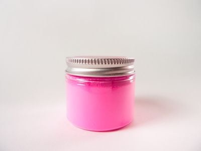 A jar of the world's pinkest pink paint pigment.