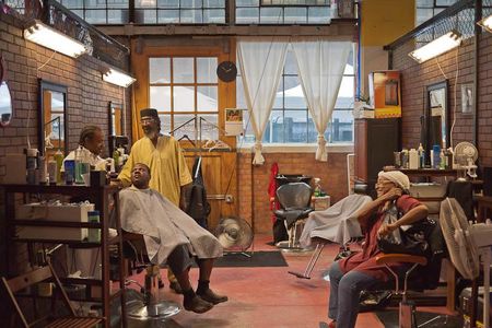 Older community barbershops in Detroit serve as community gathering places.