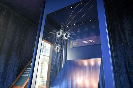 The damage inflicted to the glass box encasing Magna Carta