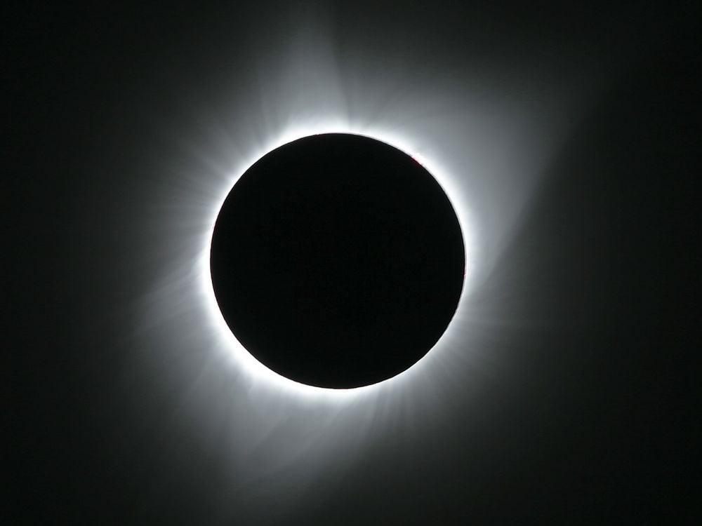 moon blocks out the sun in a total solar eclipse