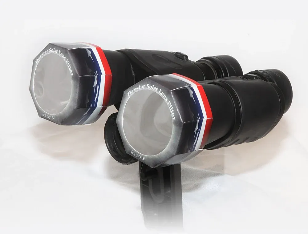 A pair of add-on solar filters for 70-millimeter binoculars