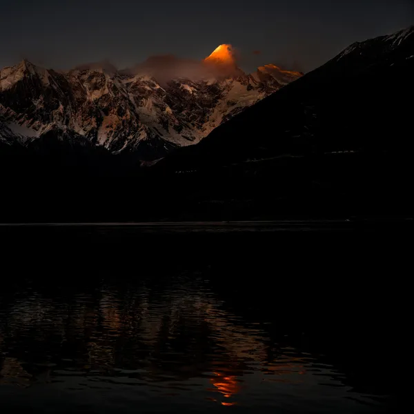 Clouds Embracing the Golden Summit of Mount Namcha Barwa thumbnail