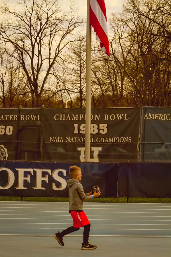 Youth, Football and the American Flag thumbnail