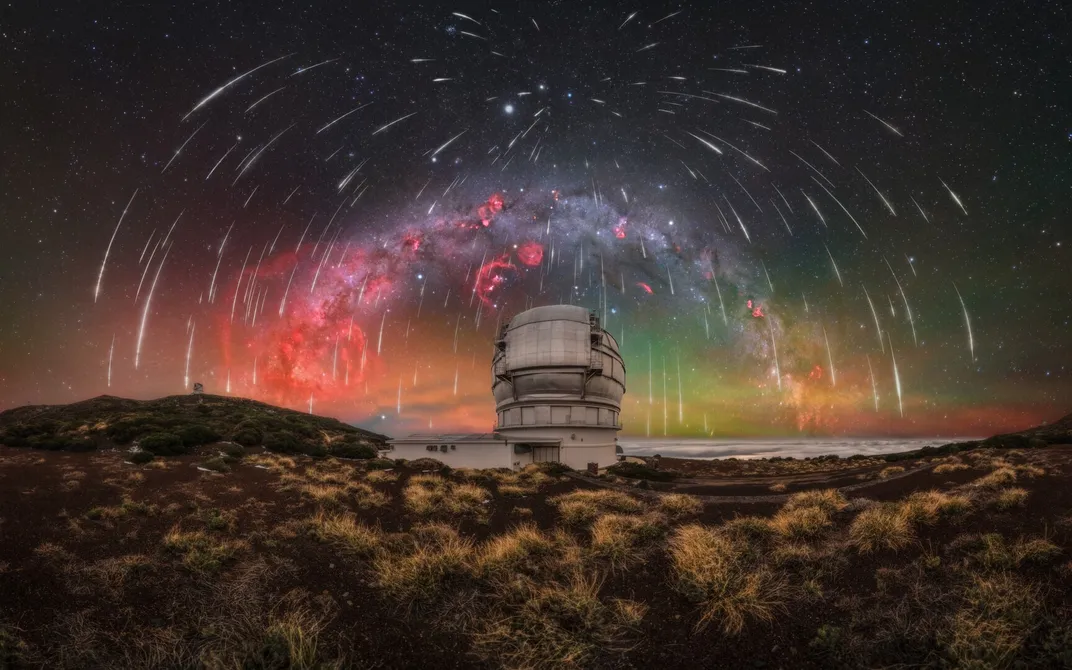 the Milky Way and Geminid meteors over a large telescope