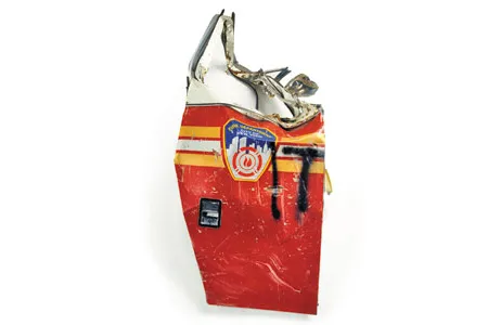 More than 50 artifacts from the September 11 attacks, including Fire Truck Door, 2001, will be displayed at the American History Museum.