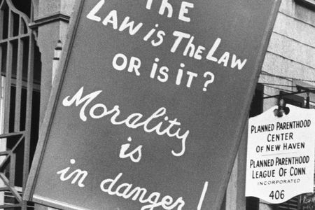 Before the critical 1965 Supreme Court ruling Griswold v. Connecticut, state and federal morality laws prohibited access to contraceptives, even to married couples (above: a picketer protests the opening of a new Planned Parenthood Center in New Haven, Connecticut).