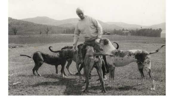Rockwell Kent with a group of dogs (detail), circa 1940 / unidentified photographer. Rockwell Kent paper, Archives of American Art, Smithsonian Institution. 